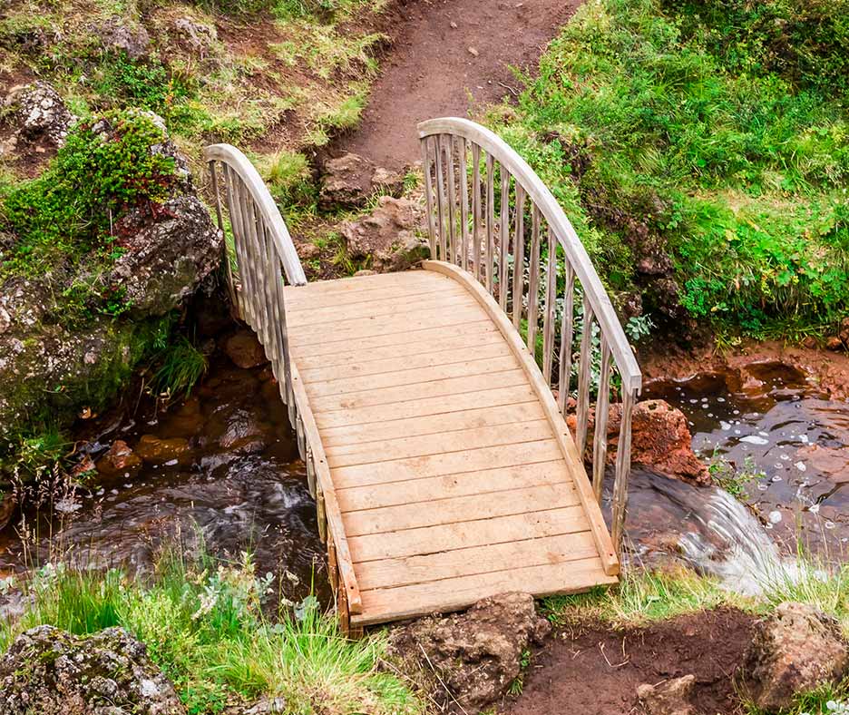 arched bridge over creek