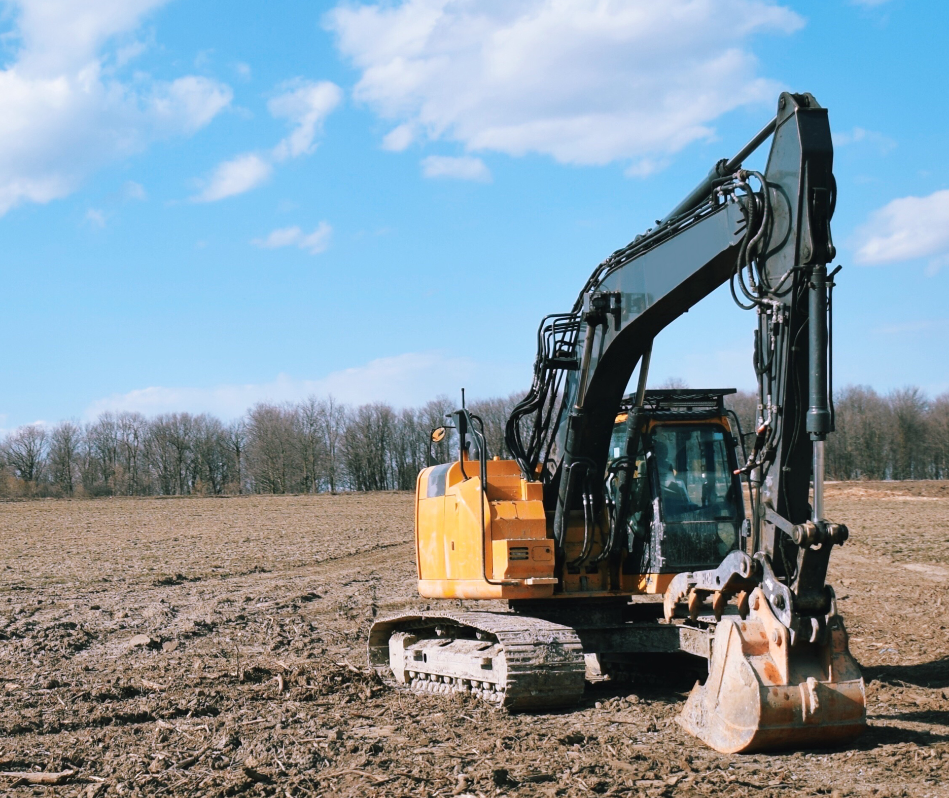 construction equipment in dirt field